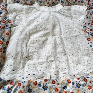 White perforated top